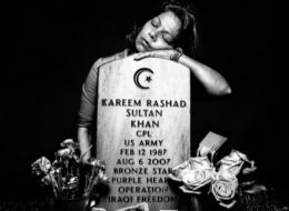 Mother lays her head on her Muslim soldier son's headstone.